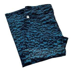Fabletics leggings Capri style key pocket on front vibrant colors Size Medium